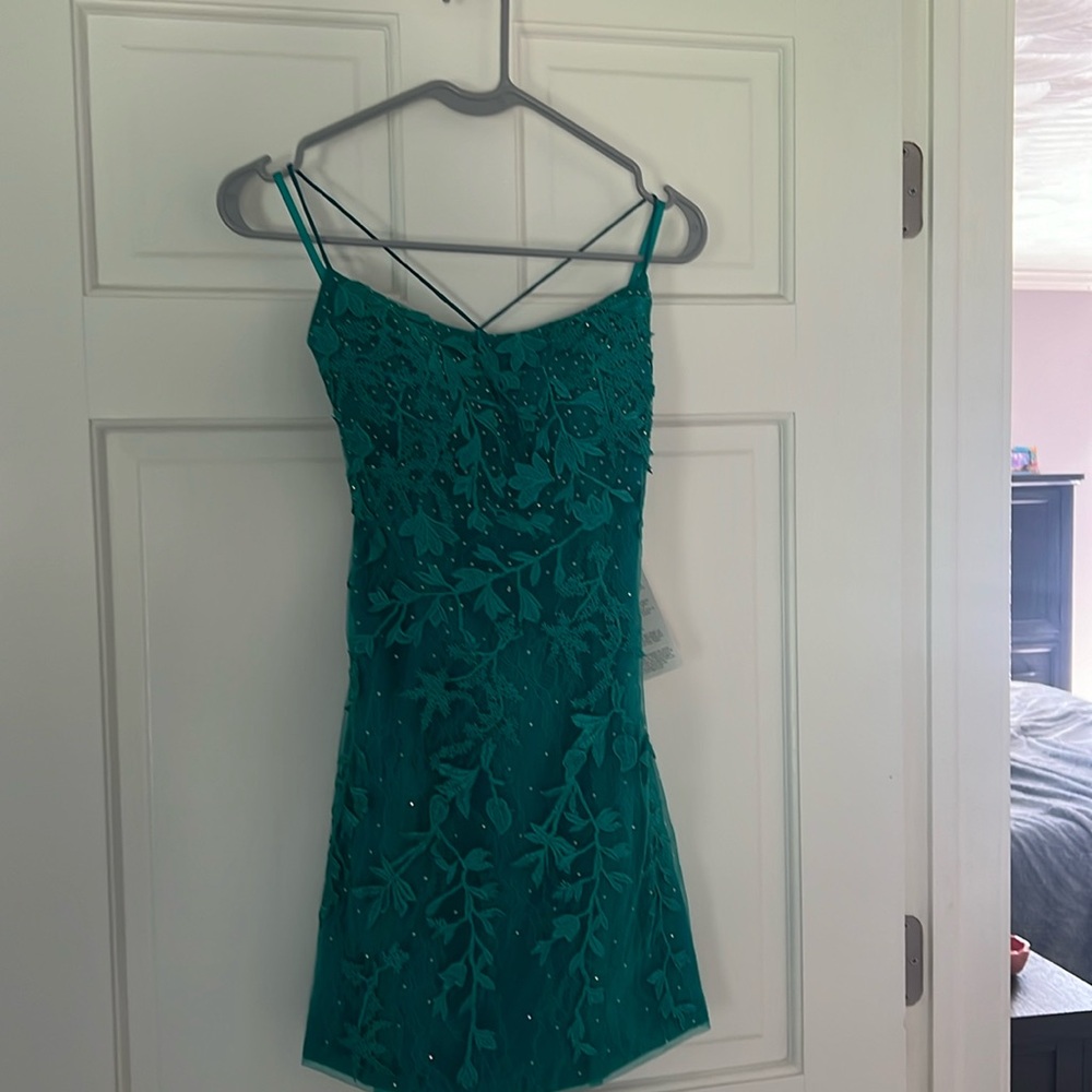 Brand new Homecoming dress from Stacees. Size 6. The color is Jade.